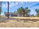 Spacious backyard with a newly constructed home, surrounded by mature trees at 872 Old Mocksville Rd # 1, Statesville, NC 28625