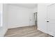 Bright bedroom featuring a clean, minimalist design with light-colored walls and flooring and generous natural light at 872 Old Mocksville Rd # 1, Statesville, NC 28625
