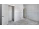 Unfinished bedroom with multiple doorways and concrete flooring ready for your finishing touches at 872 Old Mocksville Rd # 1, Statesville, NC 28625