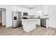 Bright kitchen features granite countertops, stainless steel appliances, and white cabinets at 872 Old Mocksville Rd # 1, Statesville, NC 28625