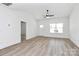 Bright living room featuring sleek flooring and natural light, offering a clear view into the home's layout at 872 Old Mocksville Rd # 1, Statesville, NC 28625