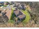 An aerial view of a lovely home with a large lawn and manicured landscaping at 1236 Avalon Pl, Matthews, NC 28104