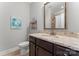 Bathroom featuring a marble countertop, vanity, and a tiled walk-in shower at 1236 Avalon Pl, Matthews, NC 28104