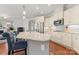 Kitchen featuring a marble island, stainless steel appliances, and white cabinetry at 1236 Avalon Pl, Matthews, NC 28104