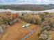 An aerial view capturing the house by the lake at 170 Stillwater Rd, Richfield, NC 28137