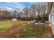Expansive backyard featuring a patio area with outdoor seating, a shed and plenty of space at 170 Stillwater Rd, Richfield, NC 28137