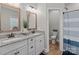 Well-lit bathroom with double vanities, granite countertops, and stylish fixtures at 170 Stillwater Rd, Richfield, NC 28137