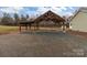 Spacious carport offering ample parking and shelter from the elements, gravel ground at 170 Stillwater Rd, Richfield, NC 28137