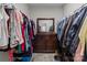 Walk-in closet featuring ample hanging space, mirror and shelving with room for storage at 170 Stillwater Rd, Richfield, NC 28137