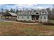 Charming craftsman-style home with inviting front porch and lush, landscaped yard at 170 Stillwater Rd, Richfield, NC 28137