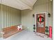 Charming front porch with swing, festive holiday decor and beautiful wood door with glass at 170 Stillwater Rd, Richfield, NC 28137