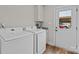 Bright laundry room with modern Samsung washer and dryer, plus convenient storage space at 170 Stillwater Rd, Richfield, NC 28137
