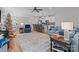 Open-concept living space boasts hardwood floors, modern lighting, and a breakfast bar at 170 Stillwater Rd, Richfield, NC 28137