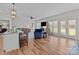Spacious living area with hardwood floors, natural light, and stylish breakfast bar at 170 Stillwater Rd, Richfield, NC 28137