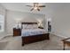 Comfortable main bedroom featuring a ceiling fan, carpet, and bedside lamps at 170 Stillwater Rd, Richfield, NC 28137