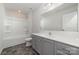 Bathroom featuring tile floors, vanity with sink, and shower-tub combo at 3033 Eastcott Ave, Monroe, NC 28110