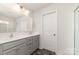 Bathroom with double sink vanity and a shower at 3033 Eastcott Ave, Monroe, NC 28110