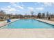 Enjoy community living with this pool featuring pristine blue water and plenty of room for relaxing and swimming at 3033 Eastcott Ave, Monroe, NC 28110