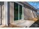 Home exterior with sliding glass door and patio at 511 E Sycamore St, Lincolnton, NC 28092