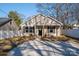 Newly built house with tan siding, black door, and a spacious yard at 511 E Sycamore St, Lincolnton, NC 28092