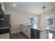 Modern kitchen with island, stainless steel appliances, and granite countertops at 511 E Sycamore St, Lincolnton, NC 28092