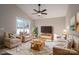 Bright living room with comfy seating and a large TV at 511 E Sycamore St, Lincolnton, NC 28092