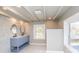 Modern bathroom with dual vanity, marble tile, and a large shower at 678 Wagner St, Troutman, NC 28166