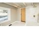 Modern bathroom with marble tile, a walk-in shower, and a barn door at 678 Wagner St, Troutman, NC 28166