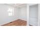 Bright bedroom with wood floors and built-in shelving at 678 Wagner St, Troutman, NC 28166