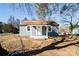 Newly renovated home with gray siding and white trim at 678 Wagner St, Troutman, NC 28166