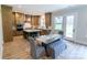 Beautiful kitchen with modern appliances, a center island, and a dining area, perfect for gatherings at 1875 Rock Hill Church Rd # 4, Matthews, NC 28104