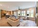 Open-concept living room seamlessly connected to the kitchen, creating an inviting and spacious area at 1875 Rock Hill Church Rd # 4, Matthews, NC 28104