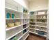 Walk-in pantry with lots of shelving for ample storage space at 1875 Rock Hill Church Rd # 4, Matthews, NC 28104