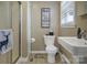 Bathroom with a shower, toilet, and sink at 216 Delview Dr, Cherryville, NC 28021