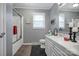 Bathroom with gray walls, a vanity, tile floors, and tub-shower combo at 216 Delview Dr, Cherryville, NC 28021