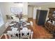Charming dining area featuring a dark wood table with seating for six and hardwood floors at 216 Delview Dr, Cherryville, NC 28021