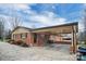 A single Gathering brick home with an attached carport at 216 Delview Dr, Cherryville, NC 28021