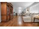 Spacious living room featuring gleaming hardwood floors, comfortable seating, and plenty of natural light at 216 Delview Dr, Cherryville, NC 28021