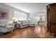 Bright living room featuring hardwood floors, neutral walls and comfortable seating at 216 Delview Dr, Cherryville, NC 28021