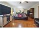 Inviting living room featuring hardwood floors, a comfortable sofa, and stylish décor at 216 Delview Dr, Cherryville, NC 28021