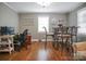 Living room featuring a workspace, a dining area, and hardwood floors at 216 Delview Dr, Cherryville, NC 28021