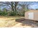 Large backyard with storage shed and mature trees at 2630 Druid Hills Way, Charlotte, NC 28206