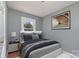 Cozy bedroom features a comfortable bed, bedside table, and stylish decor at 2630 Druid Hills Way, Charlotte, NC 28206