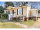 Charming single-story home with a well-maintained front yard, dark shutters and porch at 2630 Druid Hills Way, Charlotte, NC 28206