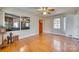 Sunroom with hardwood floors and multiple windows at 3116 Old Montgomery Place Rd, Monroe, NC 28112