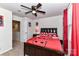 Bedroom with a Chicago Bulls themed bedspread and ceiling fan at 3218 Bouquet St, Charlotte, NC 28215