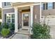 Inviting front entrance with a covered porch and landscaping at 3218 Bouquet St, Charlotte, NC 28215