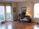 Bright home office features hardwood floors, built-in desk, and large windows at 4619 Brewington Pkwy, Rock Hill, SC 29732