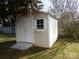 Tan storage shed with white door and window at 4619 Brewington Pkwy, Rock Hill, SC 29732