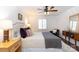 Bright bedroom with king bed, and sitting area at 4754 Hedgemore Dr # S, Charlotte, NC 28209